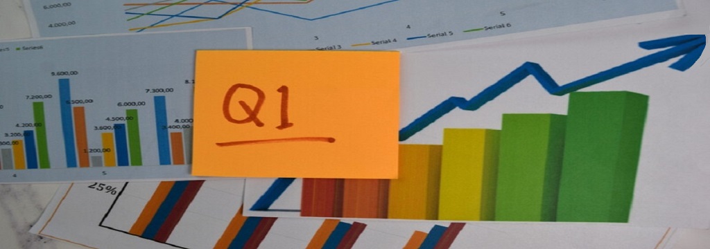 q1 written on post it note with charts and graphs_canstockphoto84101914-2 1024x360
